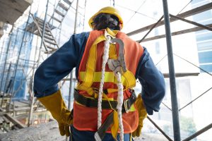 back-view-man-with-safety-equipment